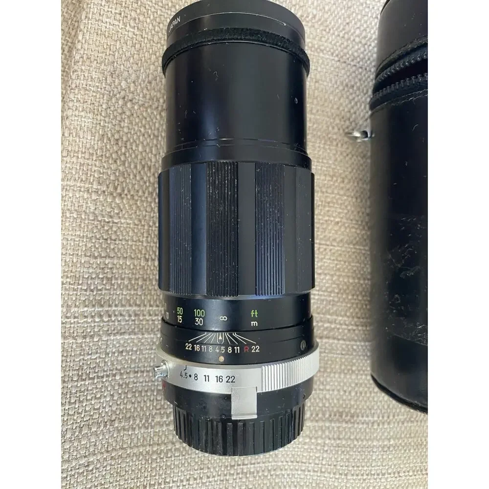 Vintage Minolta MC Tele Rokkor-PE 200mm f/4.5 manual focus telephoto lens.
